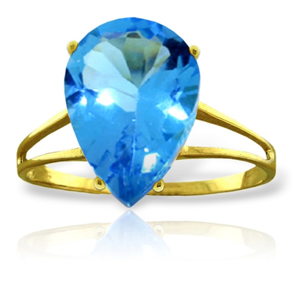 14K. SOLID GOLD RING WITH NATURAL BLUE TOPAZ
